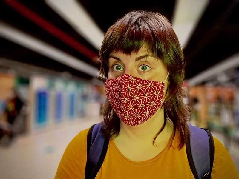 Mariana wearing a mask in a NYC camera shop