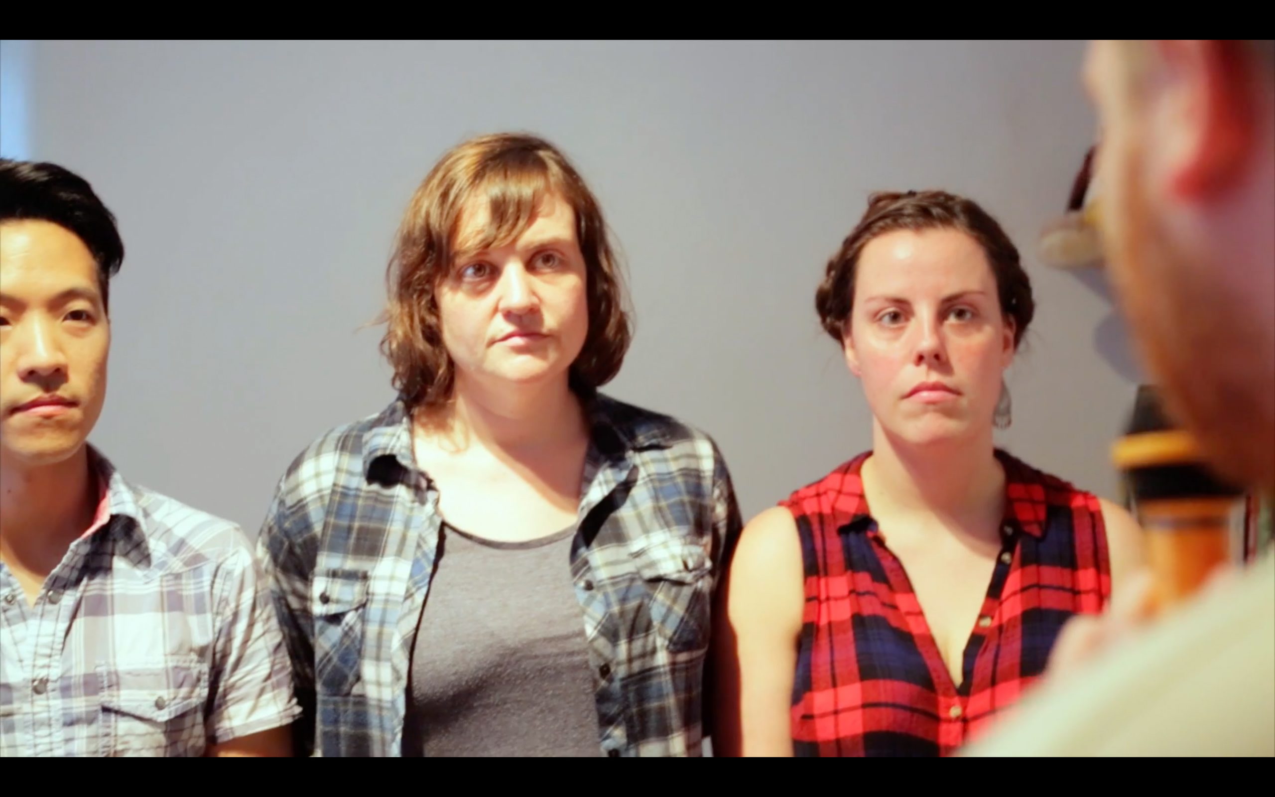 Still from Two Stand Up Comedians Living in a Flat - Stephen Lee, Lynsey Bonell and Mariana Feijó
